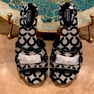 BRAND NEW! Coach “Carissa” signature Canvas Wedge Sandals in Black.